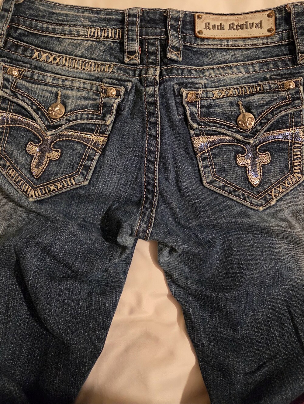 Rock Revival Woman's Dark Blue Relaxed Fit Jeans with Orange Logo Trim. 27